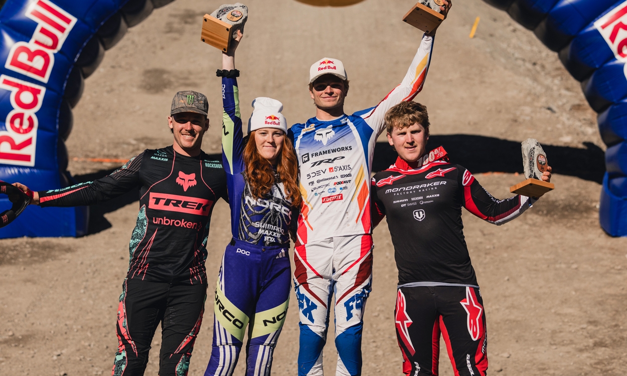 3 young men and a young woman pictured on a winners stage